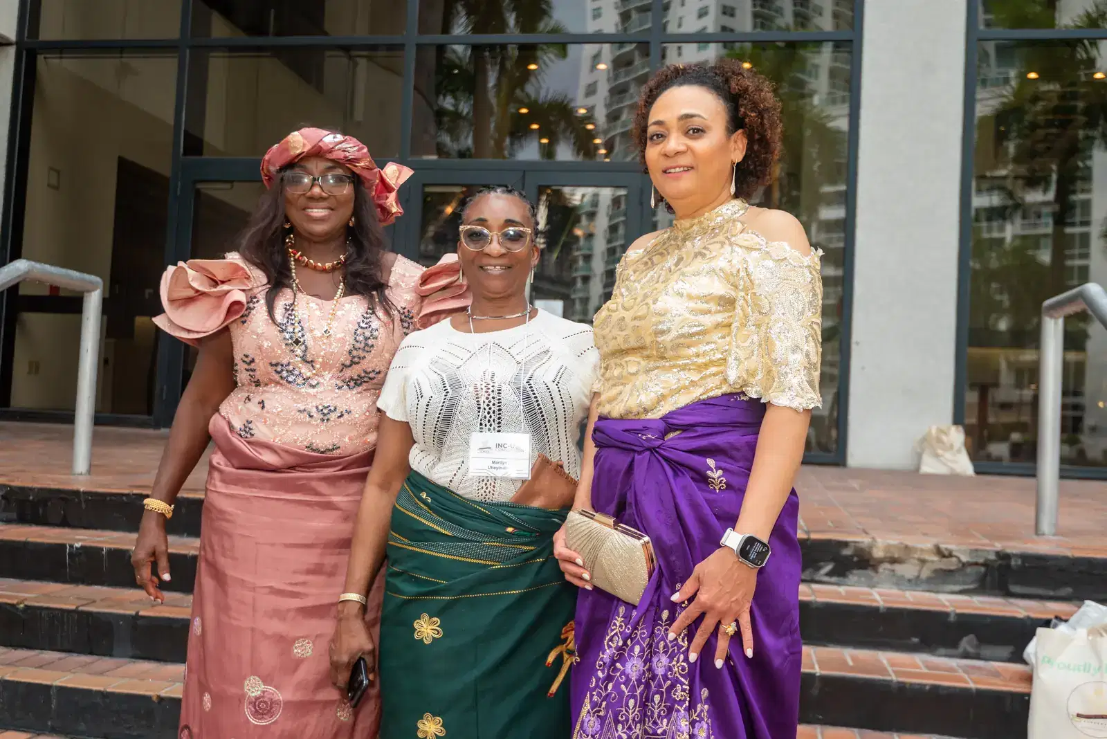 Three members in wrappers on the hotel steps, Convention 2025, Miami